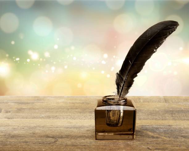 istock Quill pen with inkwell. 1160833915