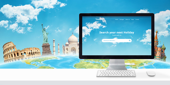 Search for holiday online concept with computer display and famous world sites behind the globe.