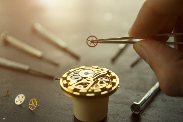 istock Watchmaker is fixing a wristwatch 1160835411
