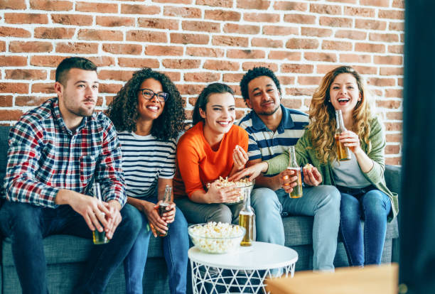 istock Group of friends watching tv 1160835684