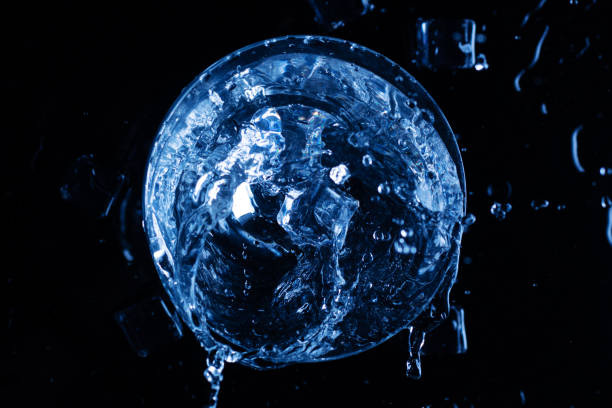 istock Splash in a glass with a cocktail and ice. View from above 1160837000