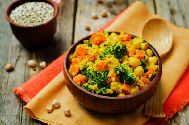 istock Quinoa broccoli carrot curry on a wood background 1160839148