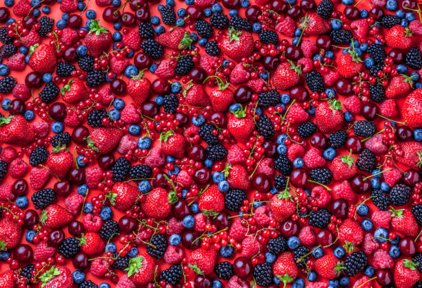 istock Berries overhead fresh arrangement strawberries blackberries red currant raspberries cherries 1160843525