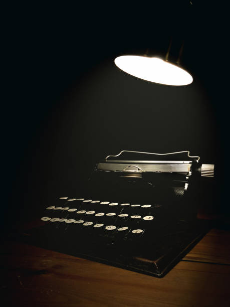 istock Typewriter with a spotlight on top of it. 1160843616