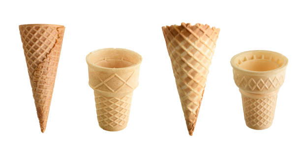 istock Collection of empty ice cream cones isolated on white background 1160846825