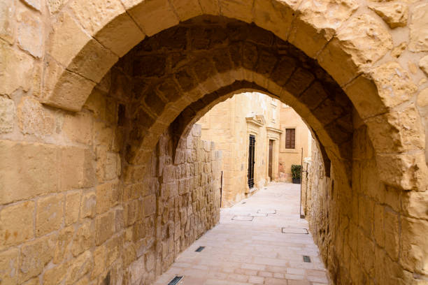 istock Narrow street in Gozo, Malta 1160852408