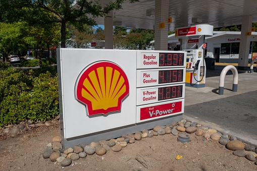Lafayette, California, United States - July 02, 2019:  Gas prices and sign with logo at Shell gas station in Lafayette, California, July 2, 2019.