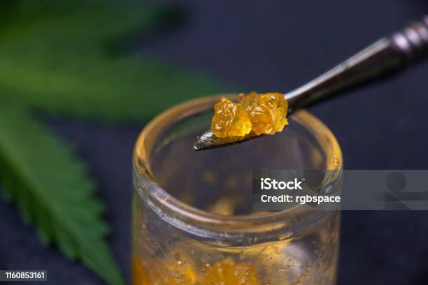 Macro Detail Of Cannabis Concentrate Live Resin Extracted From Medical Marijuana On A Dabbing Tool Stock Photo - Download Image Now