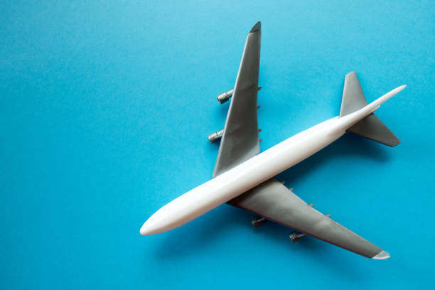 istock Model plane,airplane on blue pastel color background. 1160854639