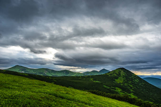 istock Rain clouds in the evening over the mountains 1160855609