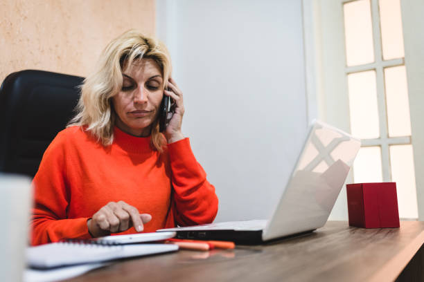 istock Business Woman Working At Home 1160855686