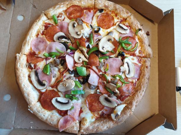 istock big pizza with mushrooms pepper and sausage 1160855795