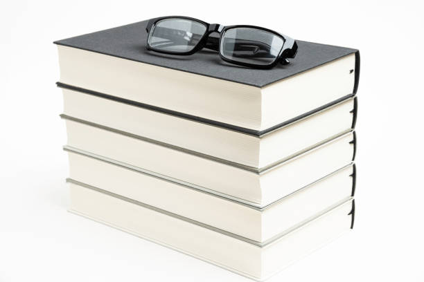 istock A Neatly Stacked Set Of Five Books With Reading Glasses 1160859249