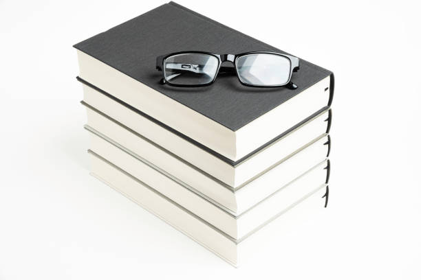 istock A Neatly Stacked Set Of Five Books With Reading Glasses 1160859251