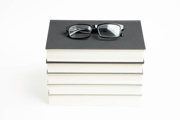 istock A Neatly Stacked Set Of Five Books With Reading Glasses 1160859252