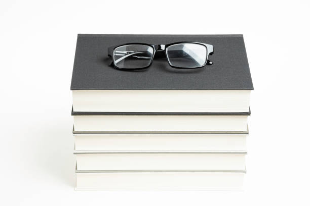 istock A Neatly Stacked Set Of Five Books With Reading Glasses 1160859304