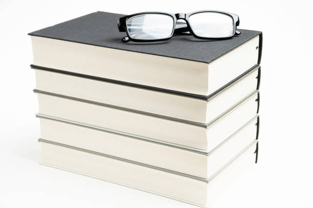 istock A Neatly Stacked Set Of Five Books With Reading Glasses 1160859307