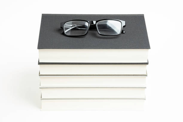 istock A Neatly Stacked Set Of Five Books With Reading Glasses 1160859308