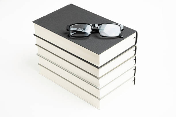 istock A Neatly Stacked Set Of Five Books With Reading Glasses 1160859310