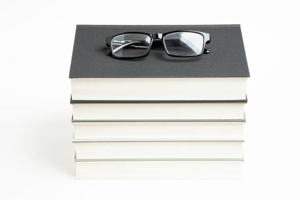 istock A Neatly Stacked Set Of Five Books With Reading Glasses 1160859334