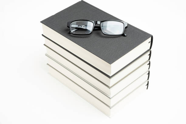istock A Neatly Stacked Set Of Five Books With Reading Glasses 1160859372