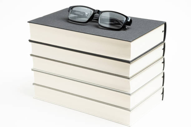 istock A Neatly Stacked Set Of Five Books With Reading Glasses 1160859413