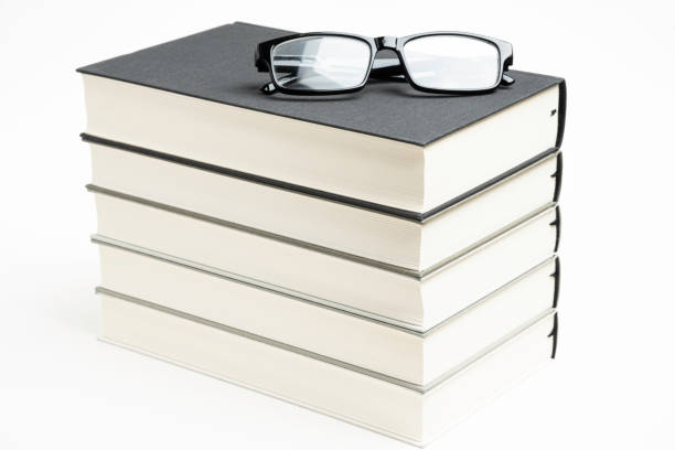 istock A Neatly Stacked Set Of Five Books With Reading Glasses 1160859414