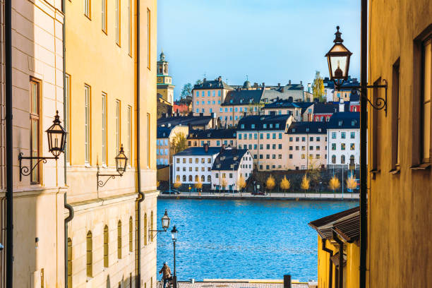 Old street in Riddarholmen, Stockholm city, Sweden. Touristic old street in Riddarholmen is a part of Gamla stan is old town of Stockholm city, Sweden. Exterior of houses, historic buildings and quay Baltic sea. stockholm stock pictures, royalty-free photos & images