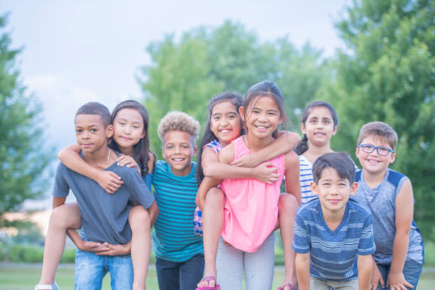 istock Happy Kids Outside Smiling Portrait 1160867113