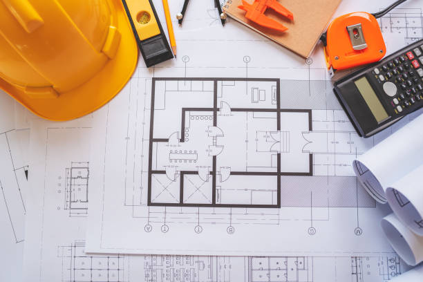 istock Top view of architectural blueprints on the worktable. 1160879577