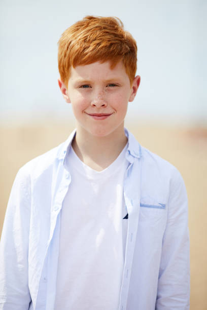 istock Portrait of redhead boy 1160883604