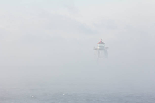 istock Lighthouse in the Fog 1160886424