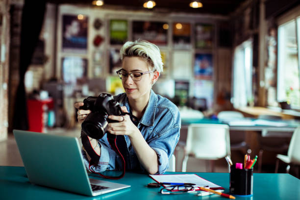 istock Female Photographer 1160888211