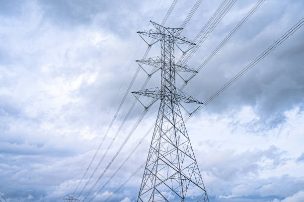 istock Electricity concept. Close up high voltage power lines station. 1160890574