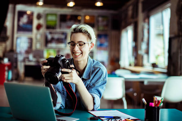 istock Female Photographer 1160890940