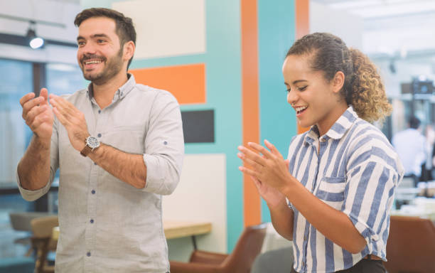 istock Group of young multiethnic diverse people gesture hand high five, laughing and smiling together in brainstorm meeting at office. Casual business with startup teamwork community celebration concept 1160892160
