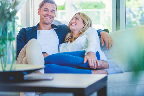 istock Couple relaxing on the sofa. 1160892346