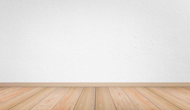 istock Empty interior room with white cement wall texture and brown wooden floor pattern. 1160894280