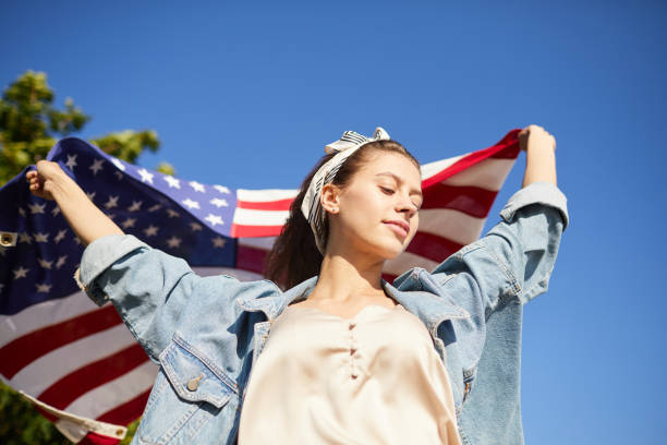 istock Free American girl with flag 1160894347