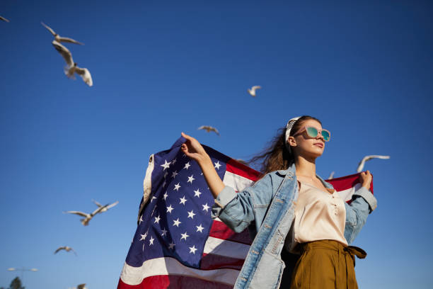 istock Stylish girl in wind 1160894352