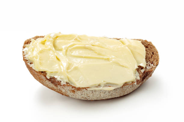 istock butter with bread isolated on white background 1160897466