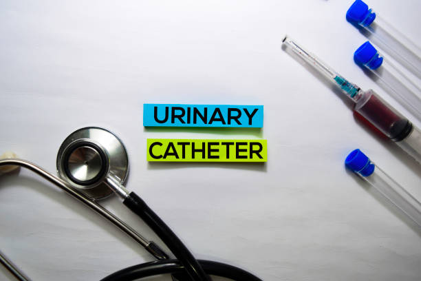 Urinary Catheter text on top view isolated on white background. Healthcare/Medical concept Urinary Catheter text on top view isolated on white background. Healthcare/Medical concept catheter photos stock pictures, royalty-free photos & images