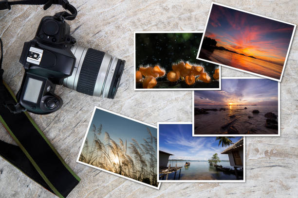 istock Old camera with stack of postcards on aged grunge vintage concrete floor 1160905457