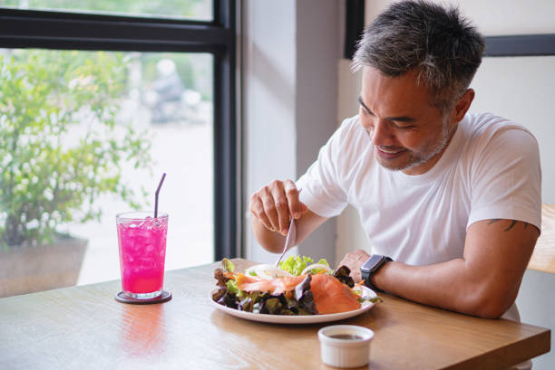 istock Young happy man enjoying in a healthy meal 1160906941
