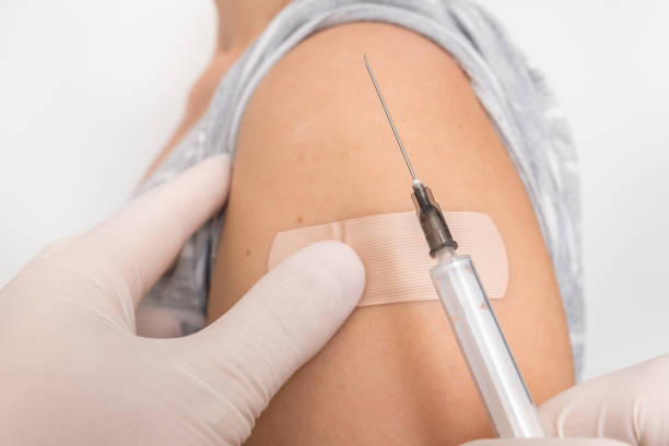 istock Woman with adhesive bandage on her shoulder 1160907644