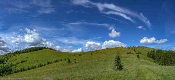 istock Green hills against the blue sky in the mountains 1160909811