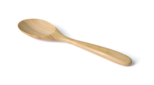 istock Wooden spoon isolated on white background with clipping path include 1160911577