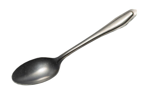 istock spoon isolated on white background. metal spoon. vintage spoon. 1160912903