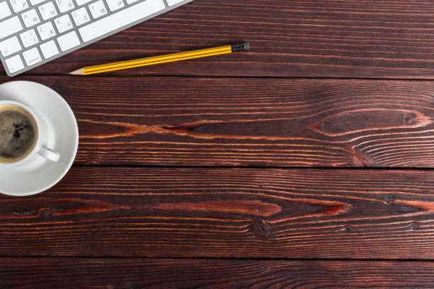 istock working place at wooden desktop with coffee 1160913733