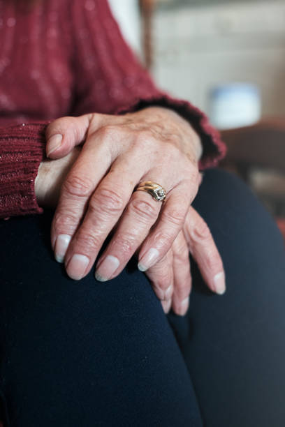 istock Folded hands of a senior woman 1160914170